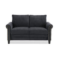 Sofá loveseat Fuka de Hanabi Living en tela gris, con cojines acolchados y estructura moderna en un ambiente de sala.