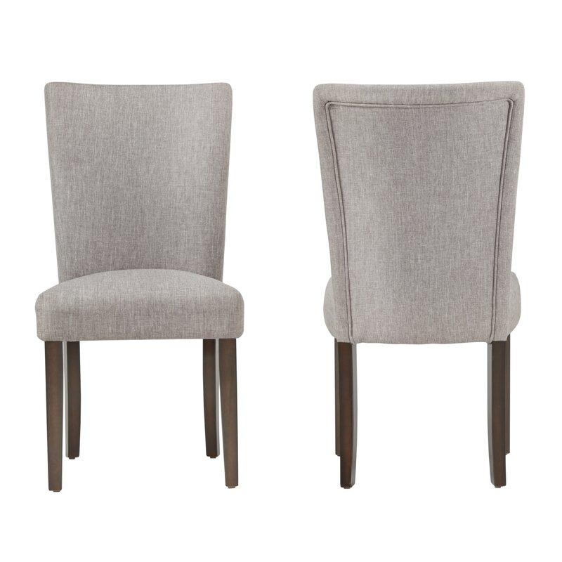 Silla de comedor Meliodas de Hanabi Living con estructura de madera y asiento acolchado en color neutro.