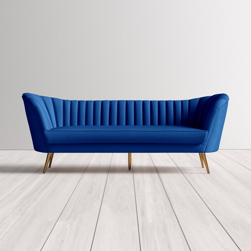 Sofa Scarlet hikari living terciopelo patas doradas