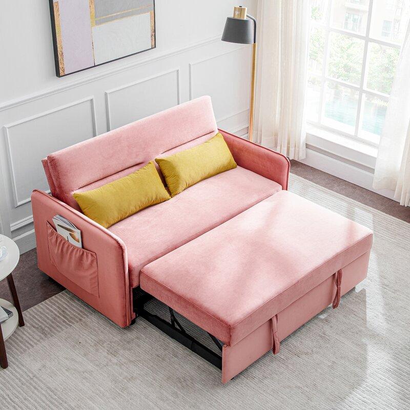 Sofá cama Beddo de terciopelo color gris oscuro, sillón de dos plazas de Hanabi Living con brazos cuadrados y cómodo diseño.