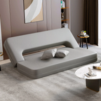 Sofá cama Hina de Hanabi Living en color gris, con cojines decorativos y estructura moderna para sala y dormitorio.